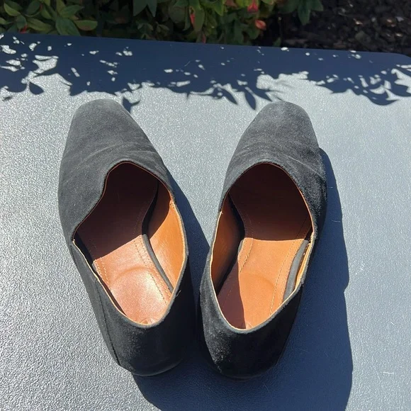 The Row black suede loafer